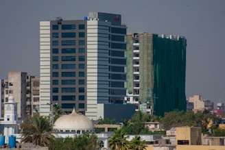 a tall building with a dome on top of it
