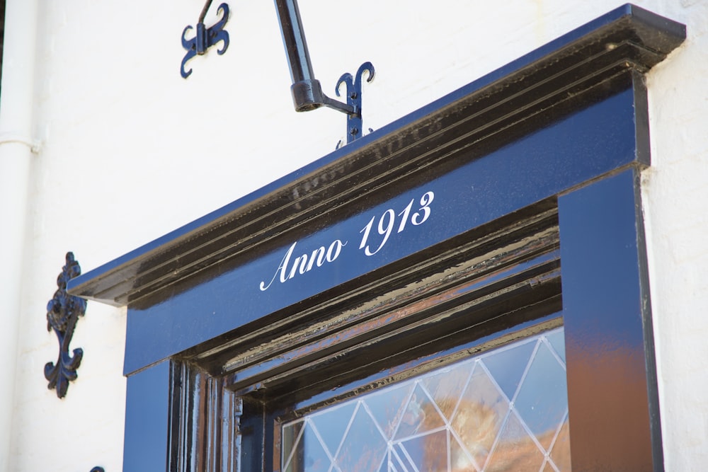 a close up of a window with a clock on it