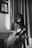 a woman sitting in a chair in a room