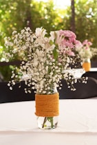 a vase filled with flowers on top of a table