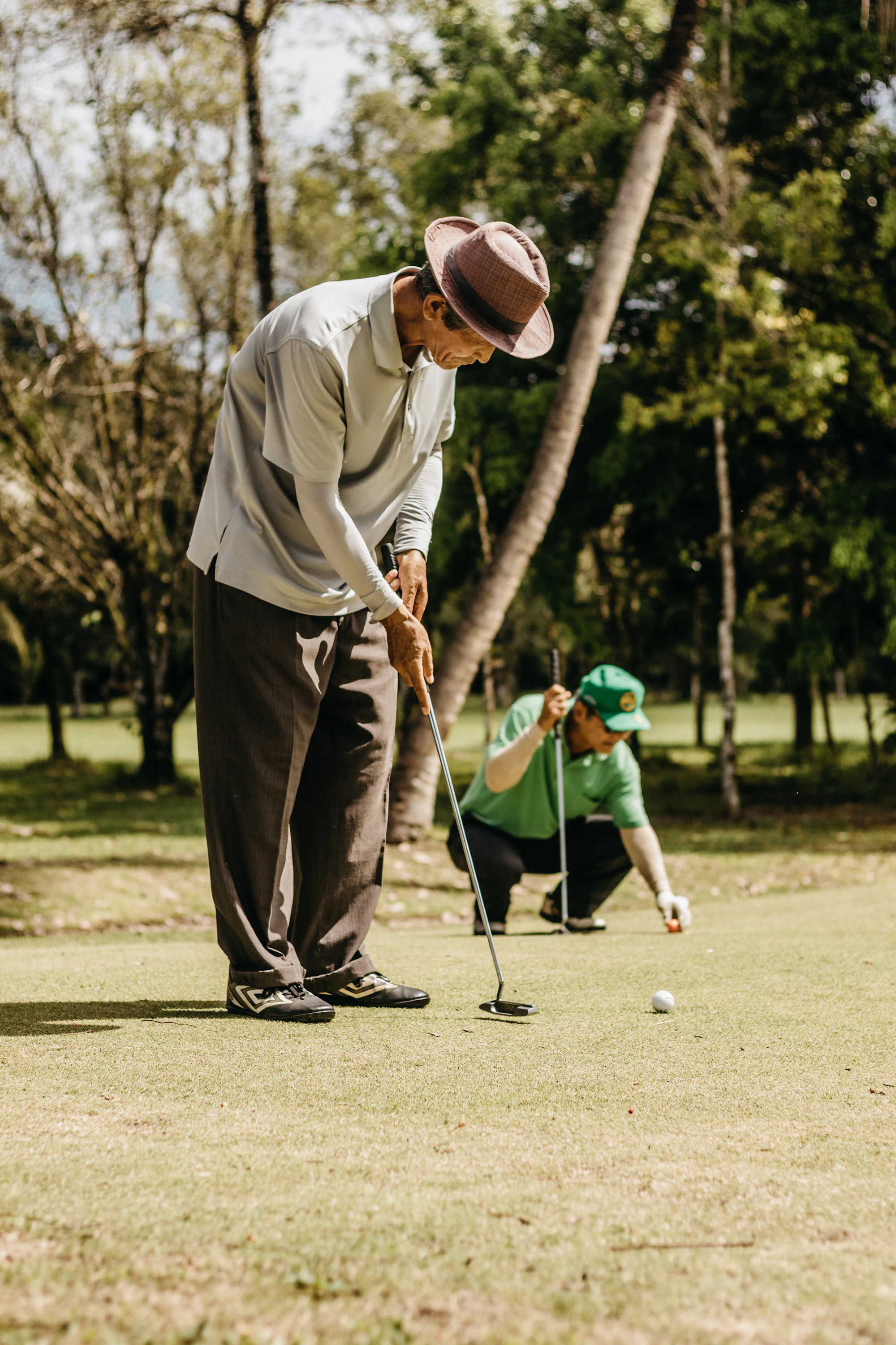 Mature man golfing — pain-free rotational power