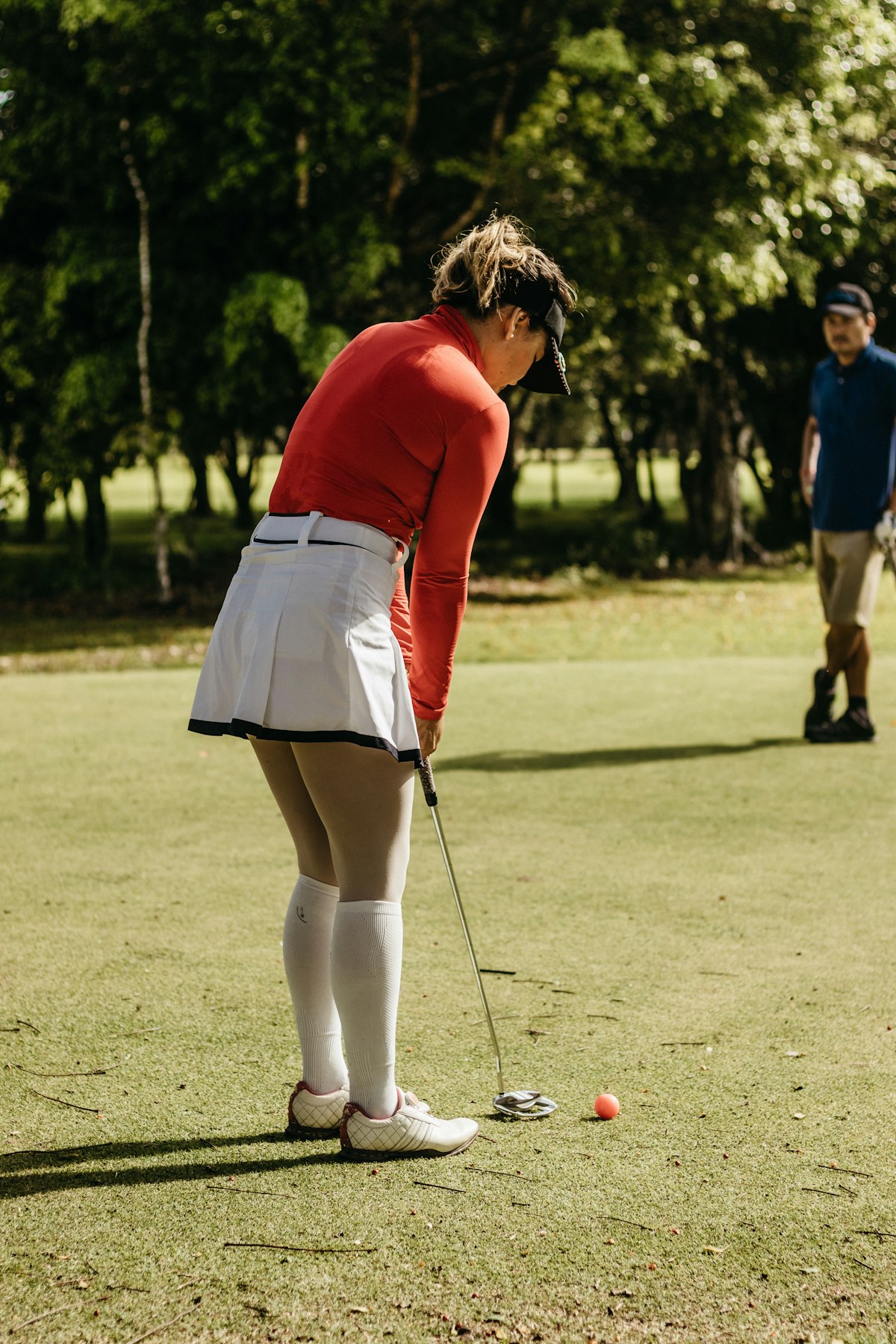 A high-tech indoor golf simulator room for year-round practice and play.