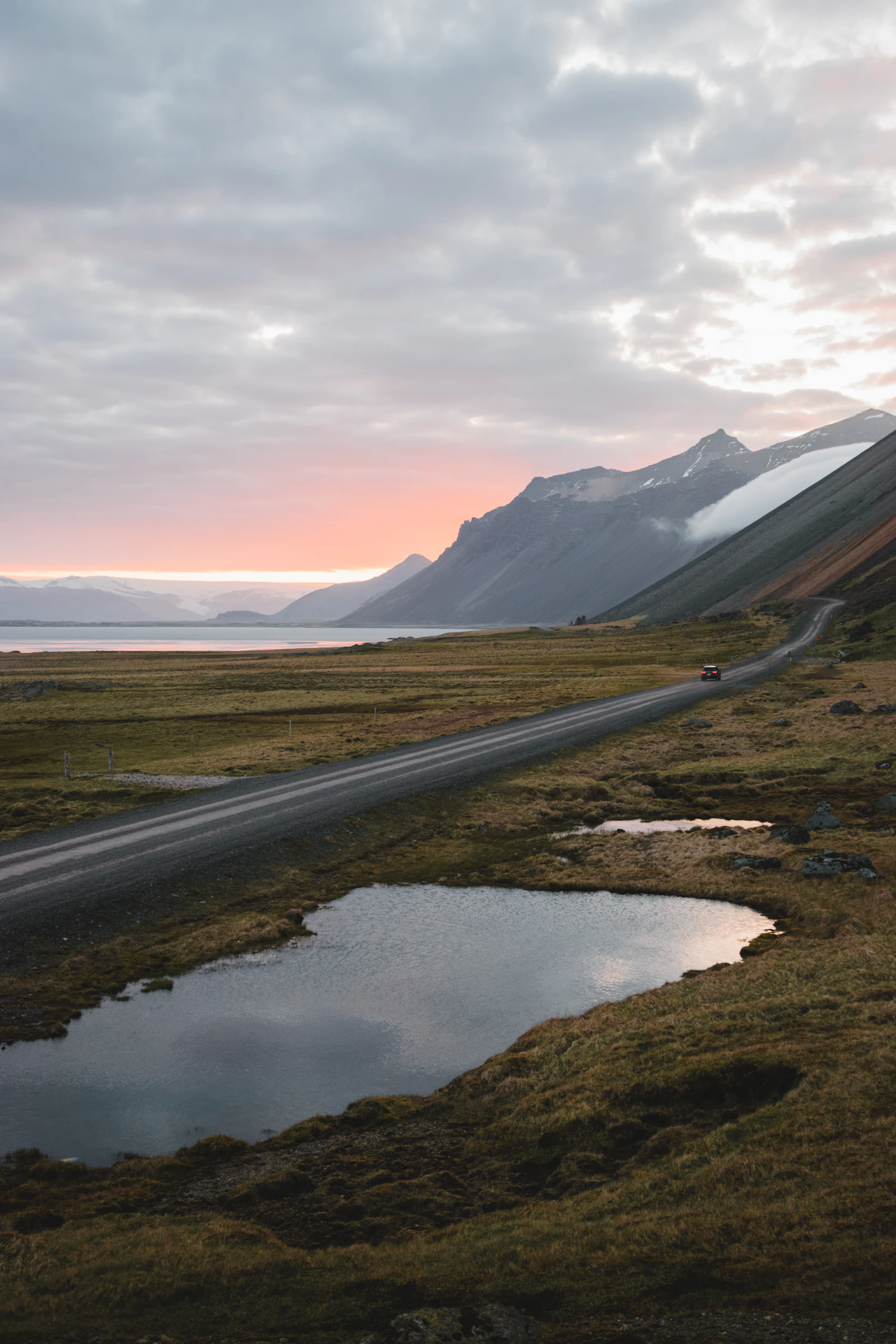An Icelandic road with standing water after poor weather