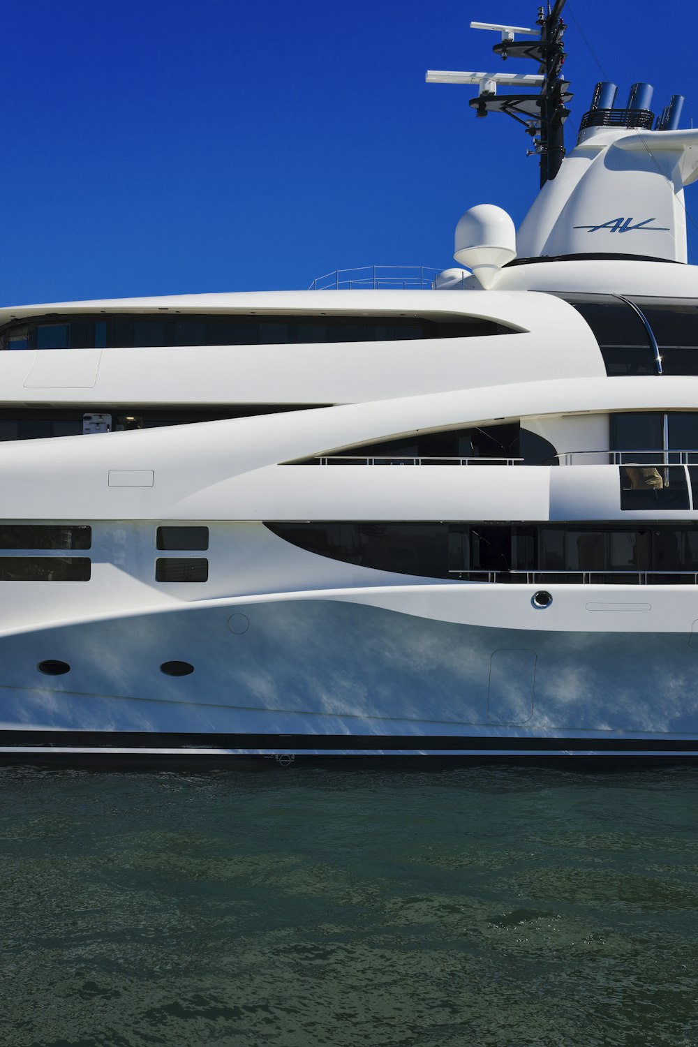 a large white boat floating on top of a body of water