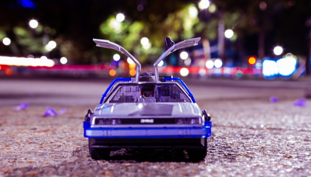 a toy car is parked on the street