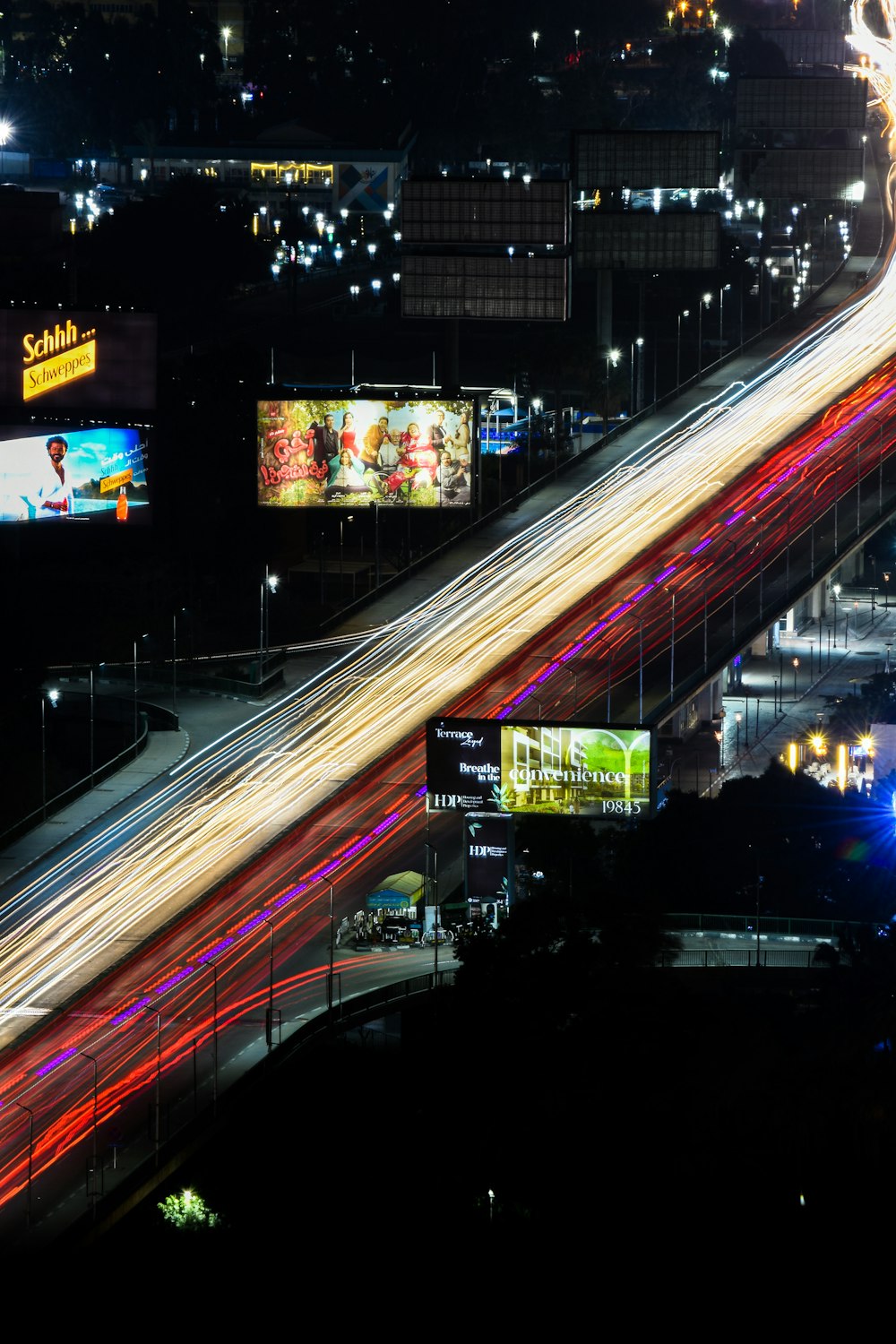 a freeway at night with a lot of lights