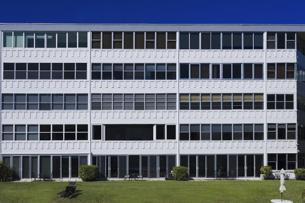 a large white building with lots of windows