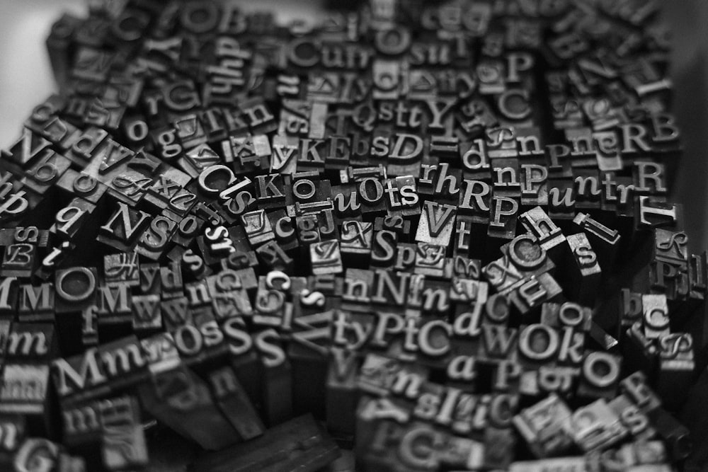 a pile of black and white type letters