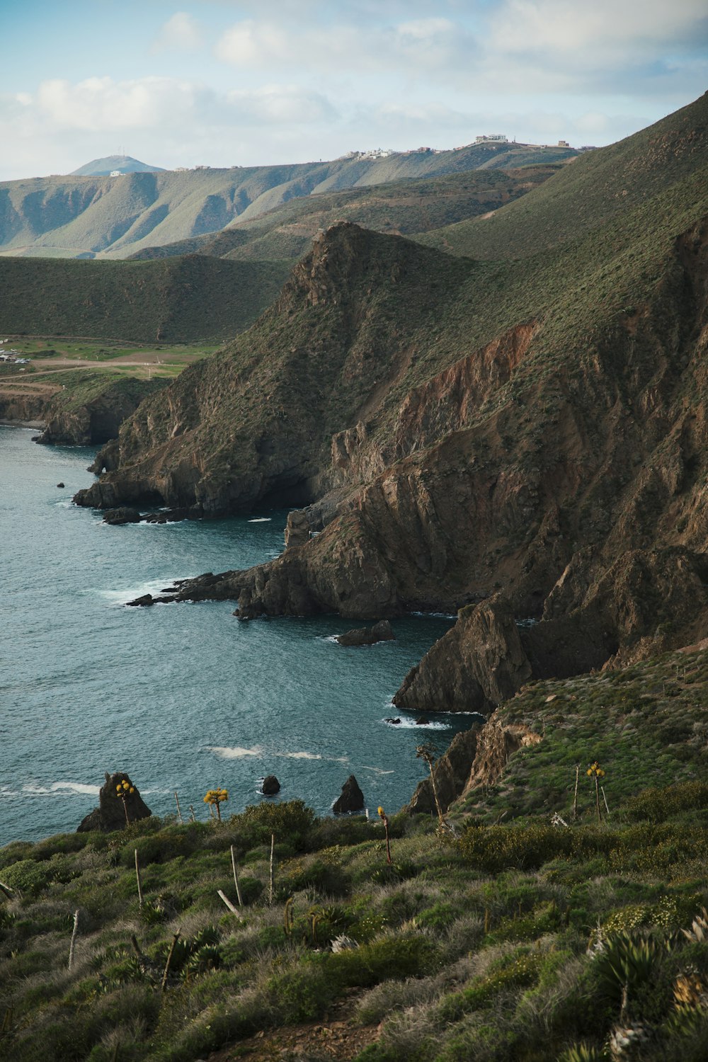 a large body of water surrounded by mountains