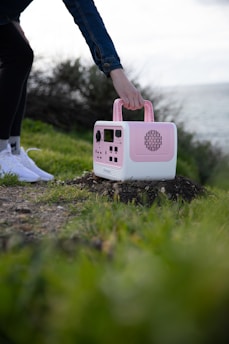 A portable device being used in an outdoor setting.