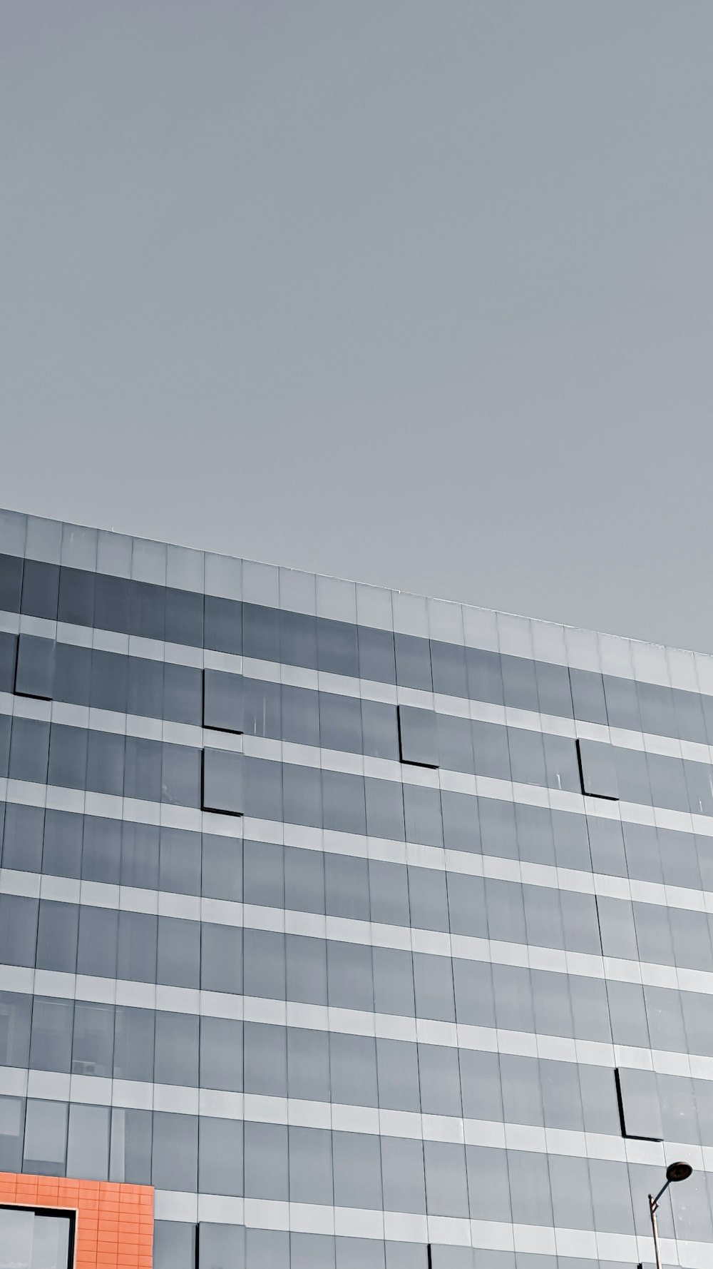 a tall building with a clock on the side of it