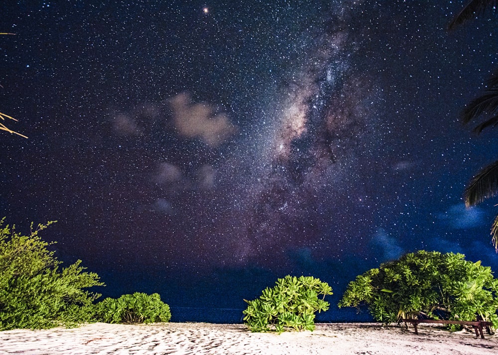 a night sky with stars and the milky