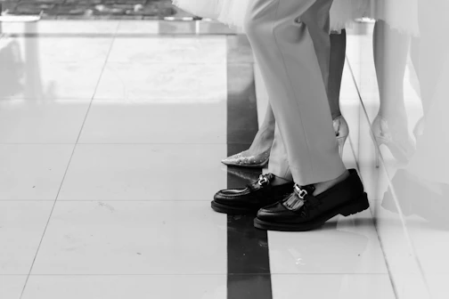 a couple of people standing next to each other