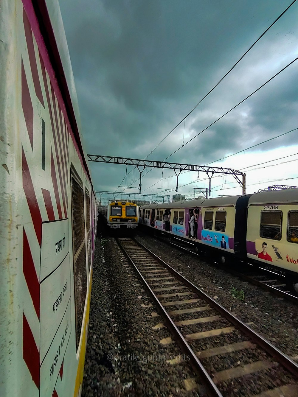 a couple of trains that are sitting on the tracks