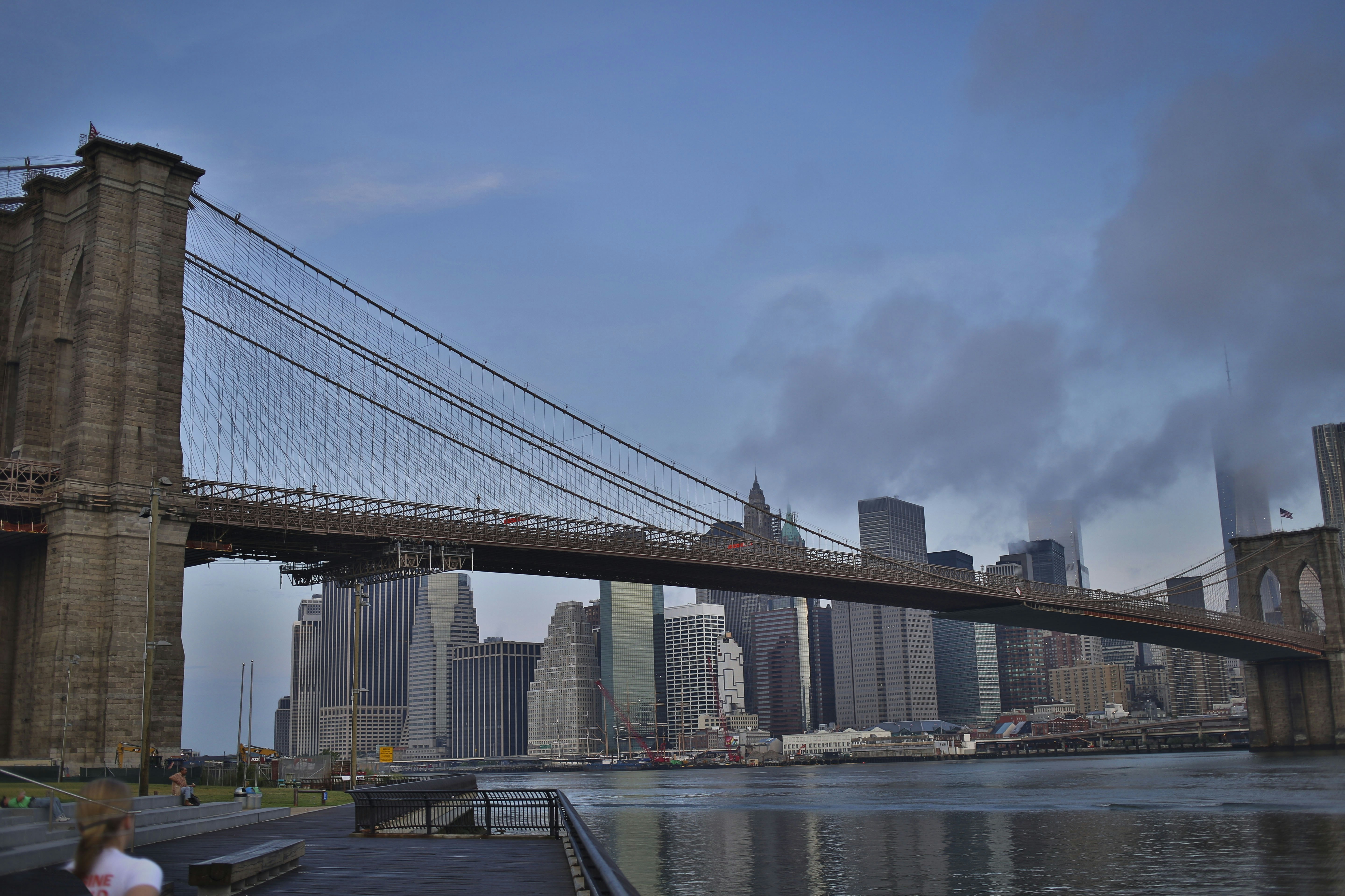 a view of the brooklyn bridge from across the river