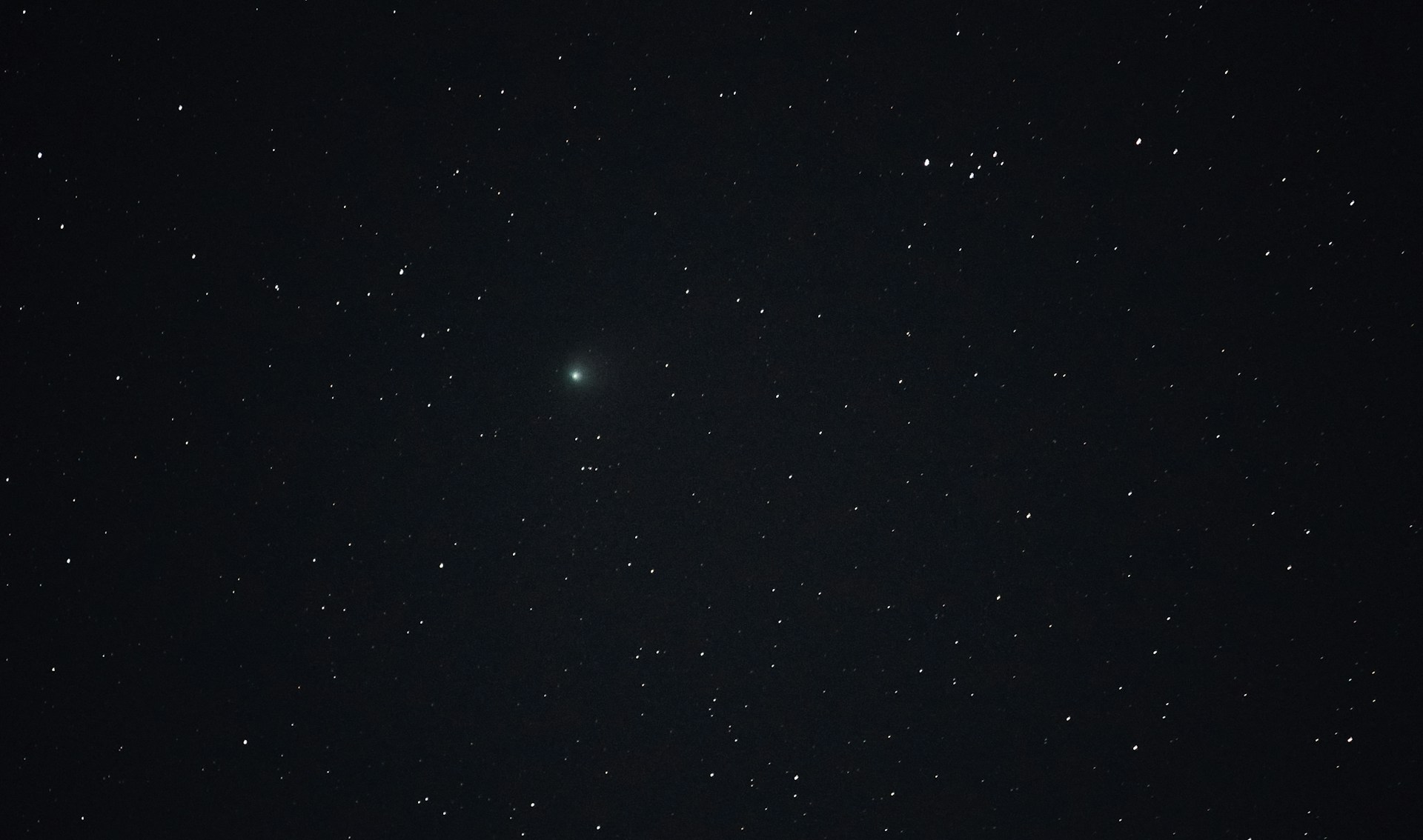 a bright star shines in the night sky