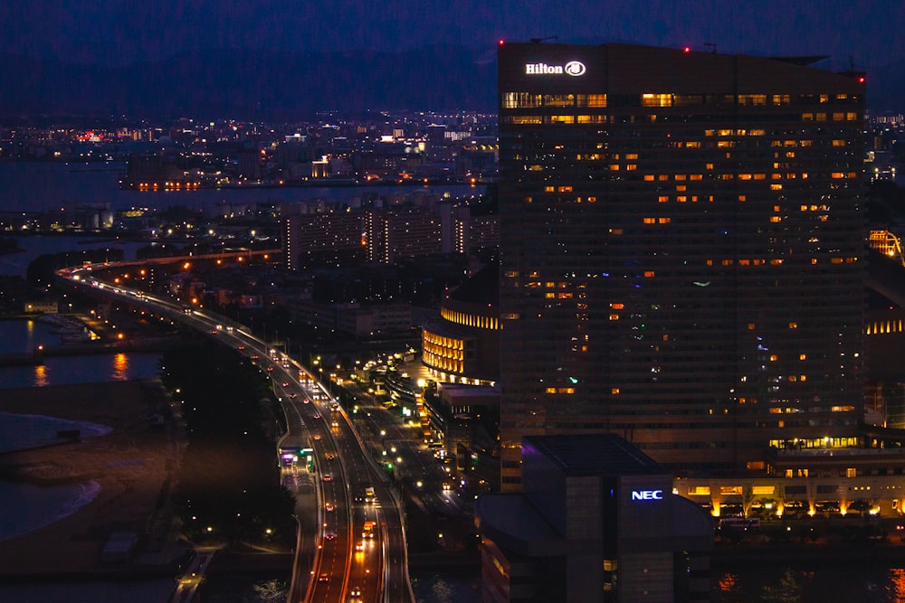 a view of a city at night from the top of a building