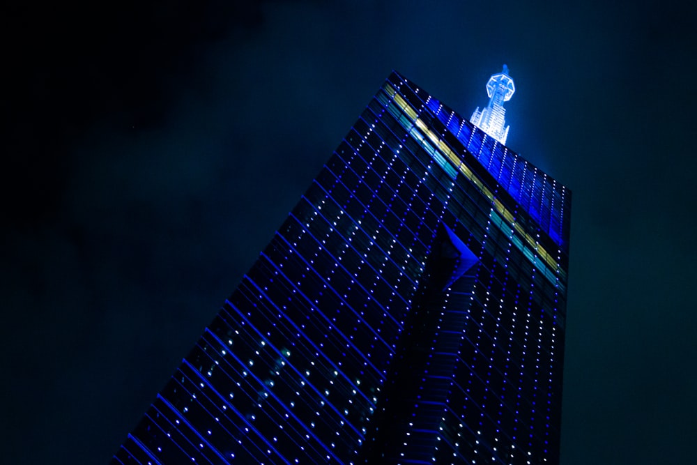 a tall building with a clock on the top of it