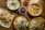 a wooden table topped with plates of food