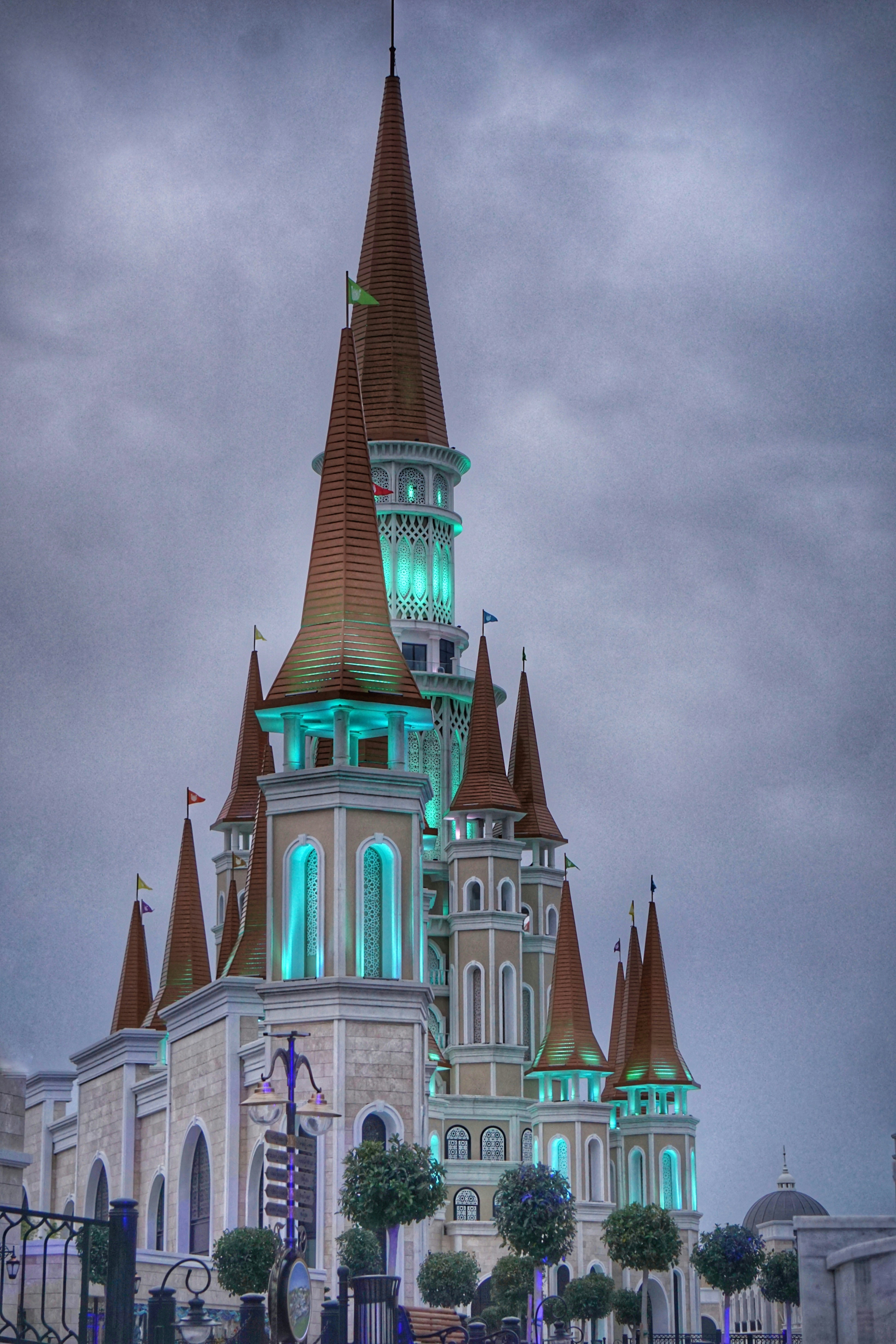 a very tall building with a clock on it's side