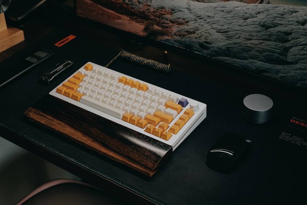 a keyboard and mouse sitting on a desk