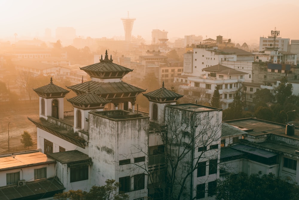 a view of a city from a rooftop of a building