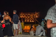 A festive scene with people celebrating New Year's Eve.