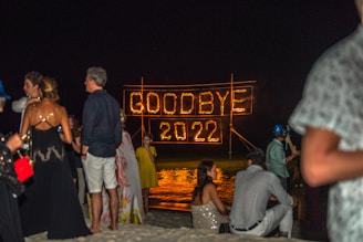 A festive scene with people celebrating New Year's Eve.