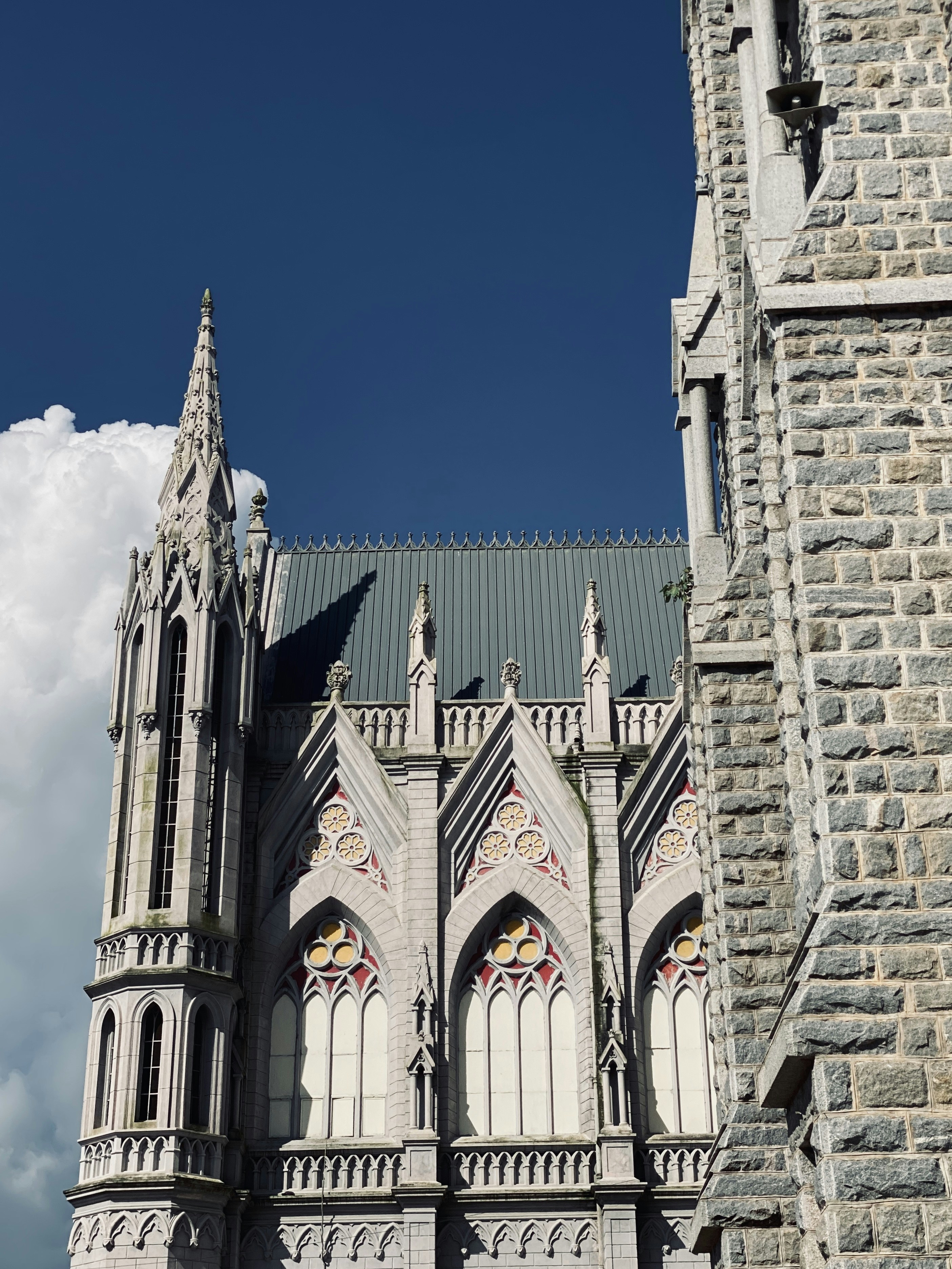 a very tall building with a clock on it's side