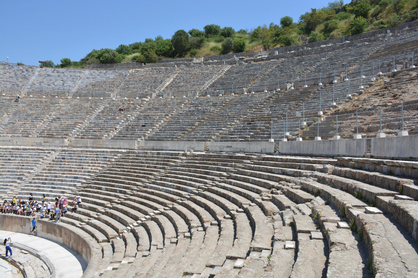 Tour group gathered at the Great Theatre of Ephesus
