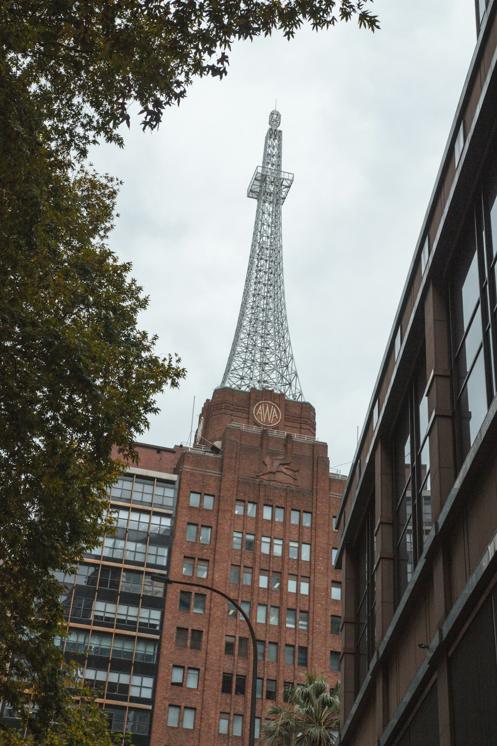 a very tall building with a clock on it's side