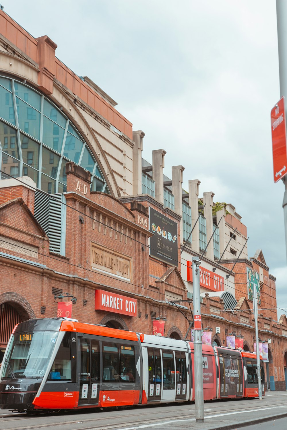 a street scene with a train on the tracks