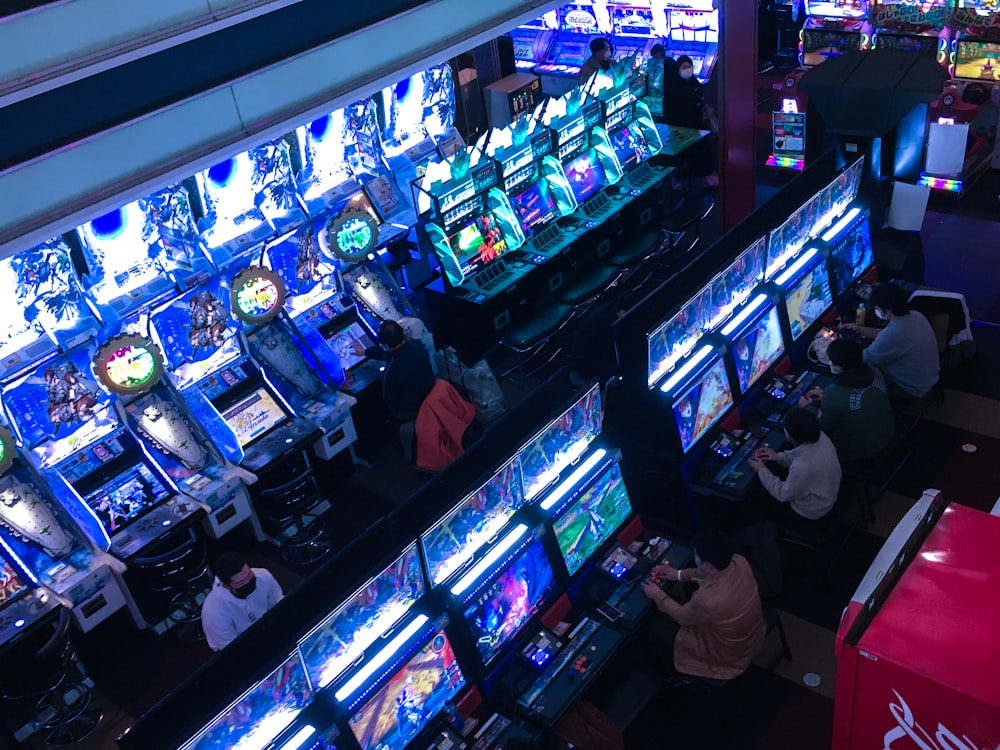 a group of people playing video games inside of a building