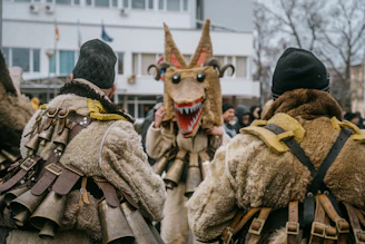 a group of people in costume walking down a street