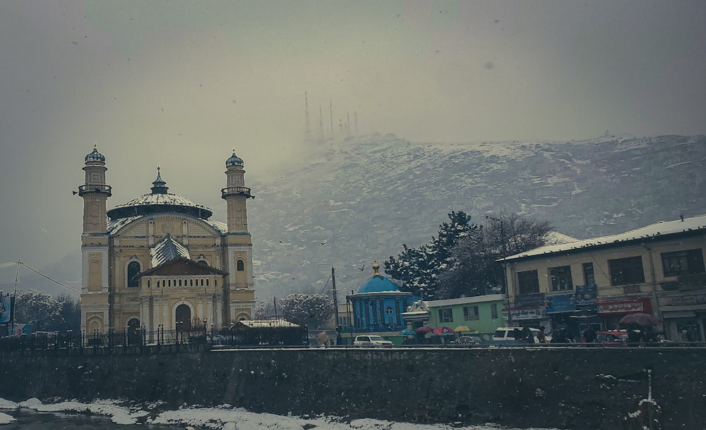 a large building with two towers on top of it