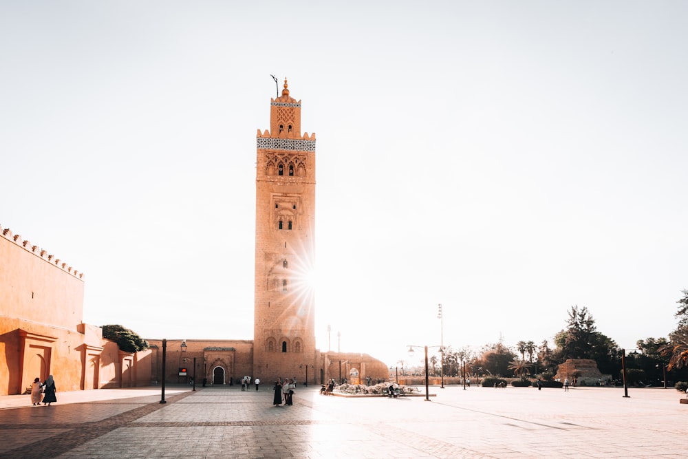 a tall clock tower towering over a city