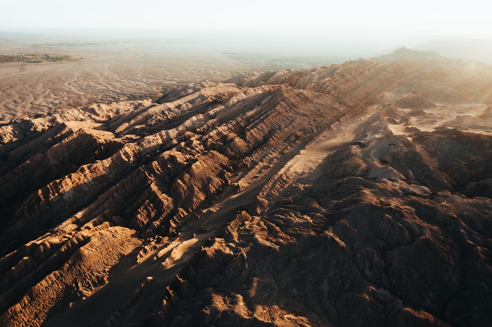 an aerial view of a mountain range in the desert