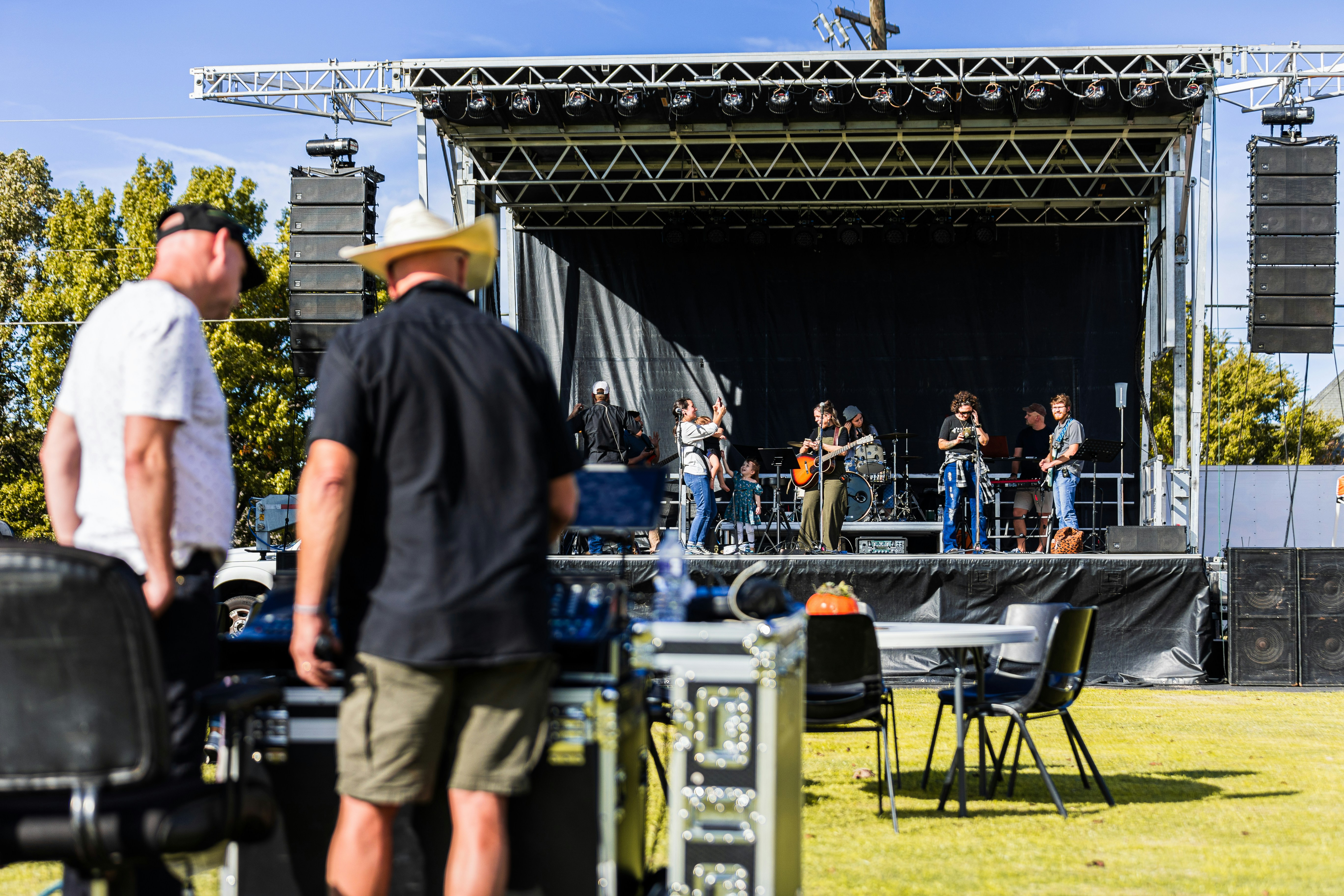 woman wearing yellow long-sleeved dress under white clouds and blue sky during daytime