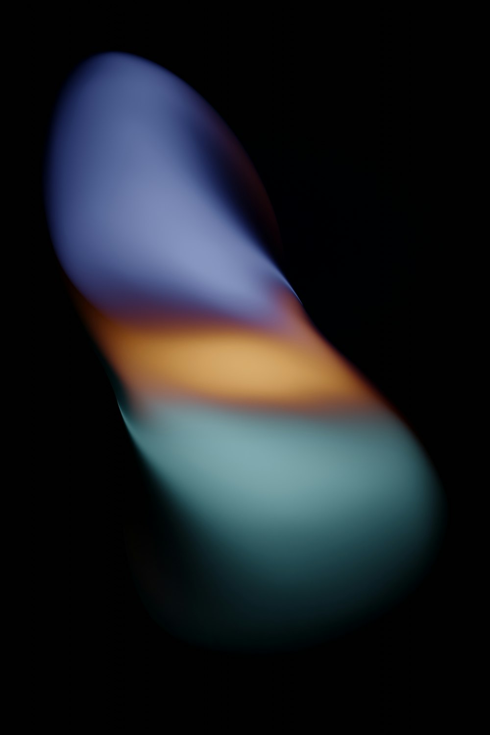 a blurry image of a blue and orange object