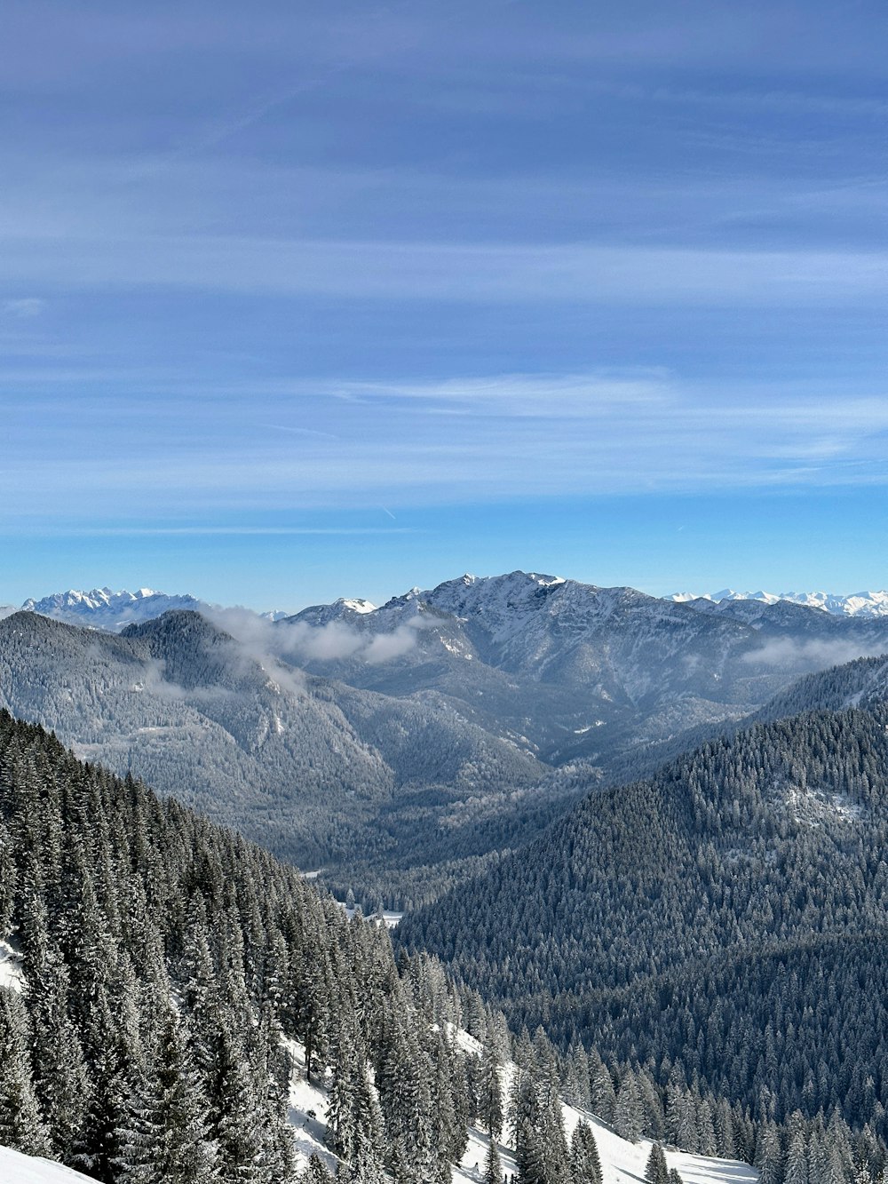 a person on a snowboard on a snowy mountain