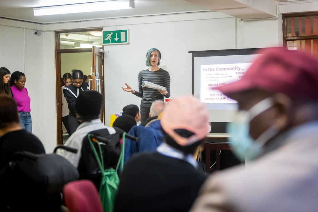 a man standing in front of a group of people