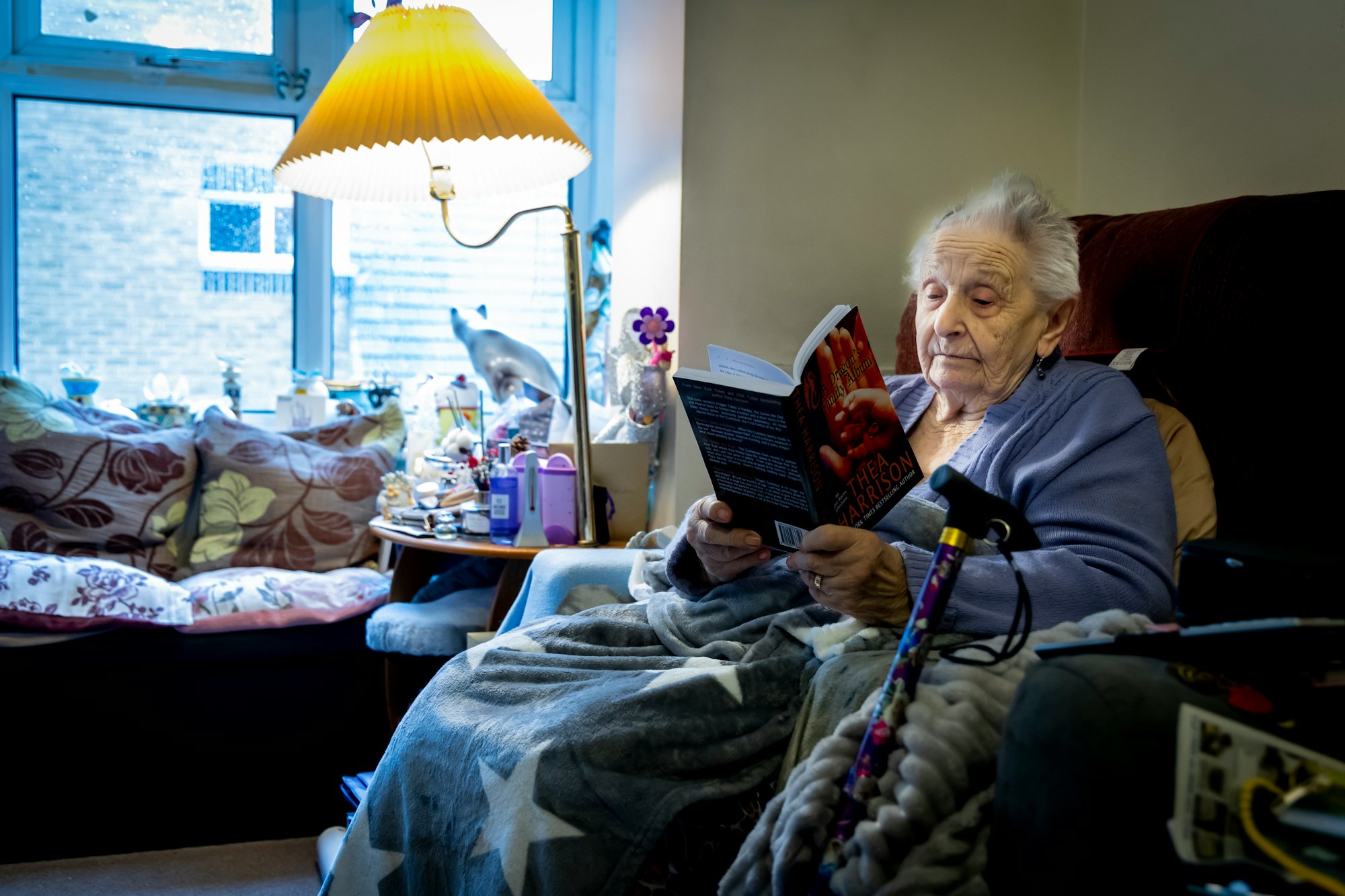 Older woman reading her book