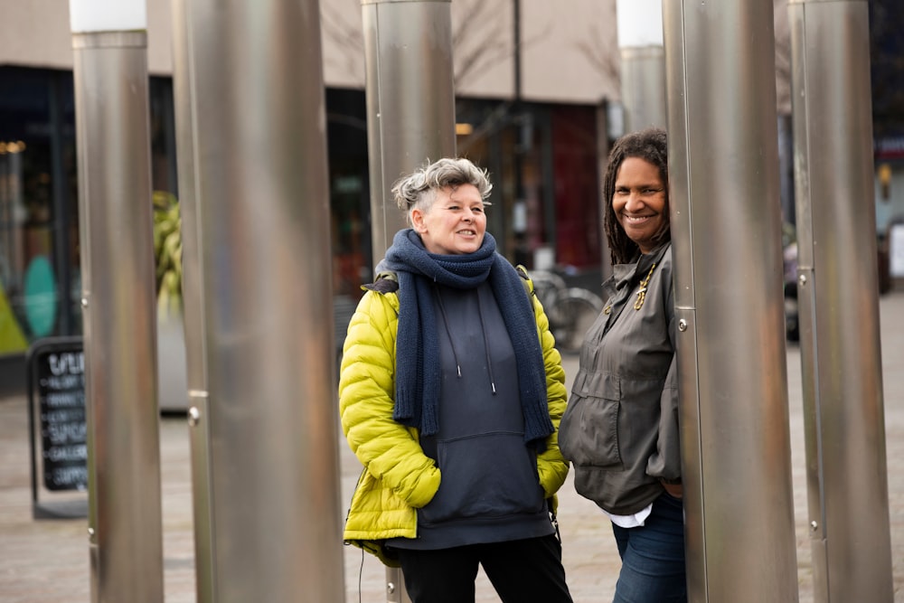 a couple of women standing next to each other