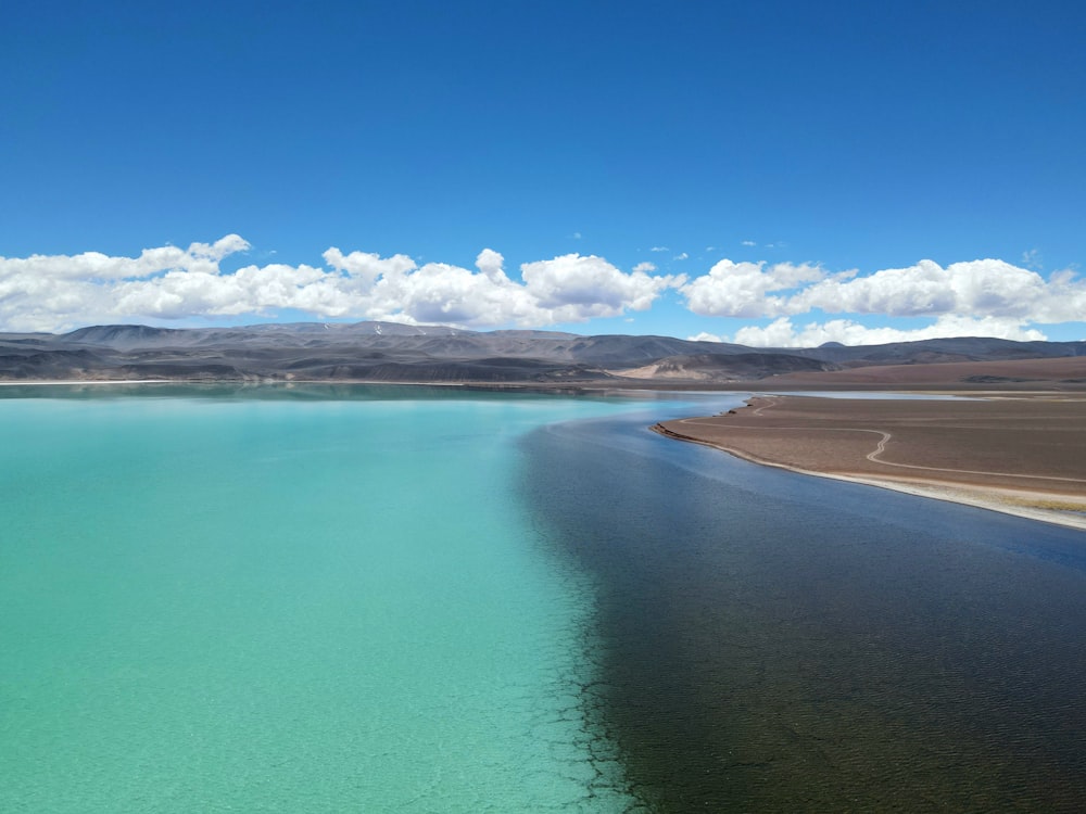 a large body of water surrounded by mountains