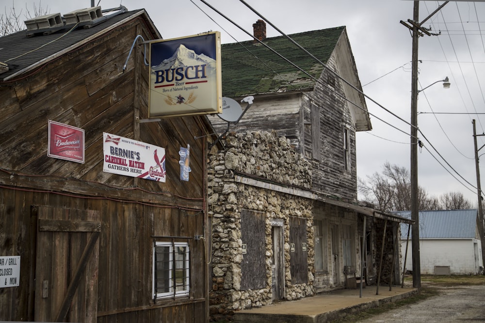 a stone building with a sign on the side of it