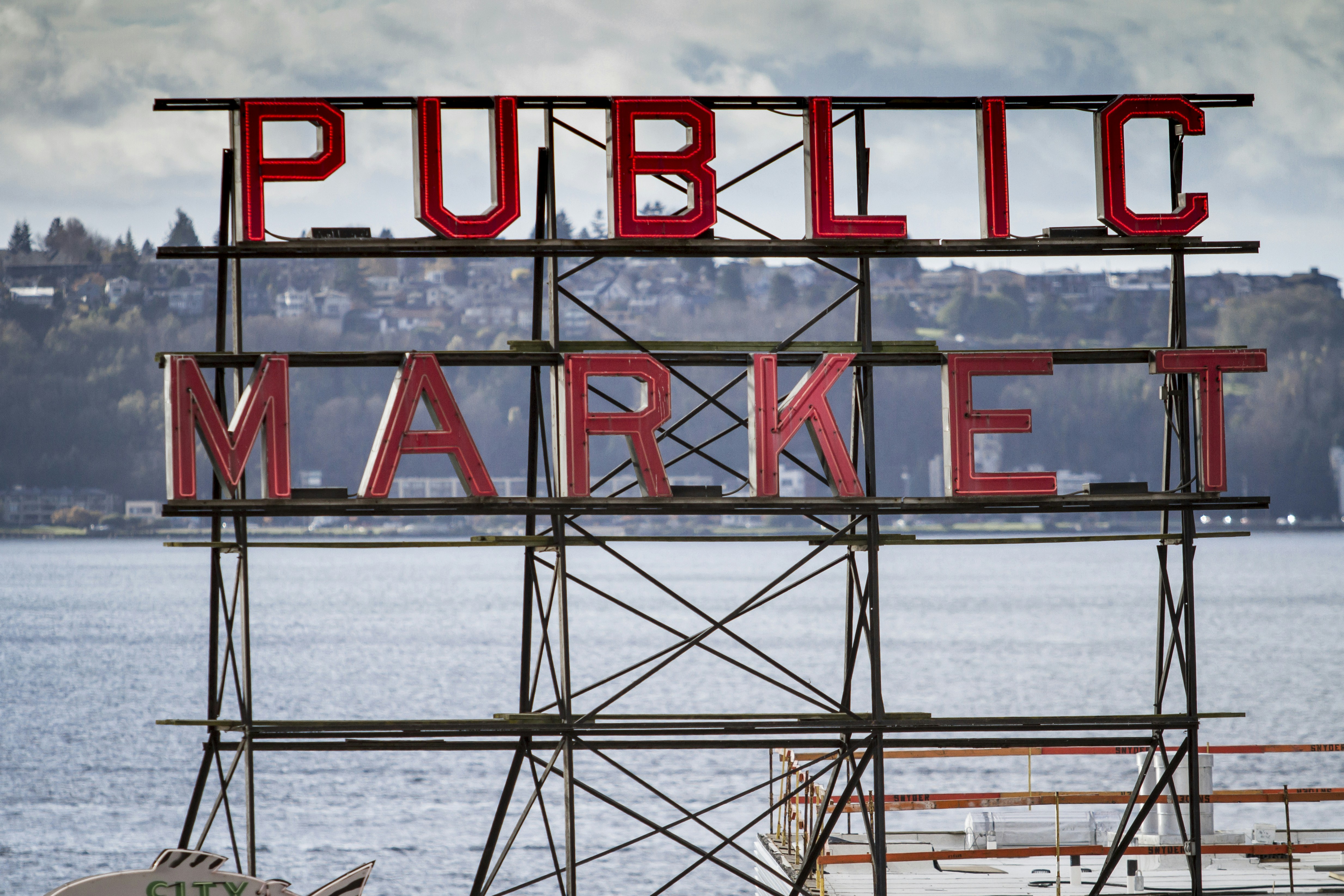 a sign that says public market on top of a building