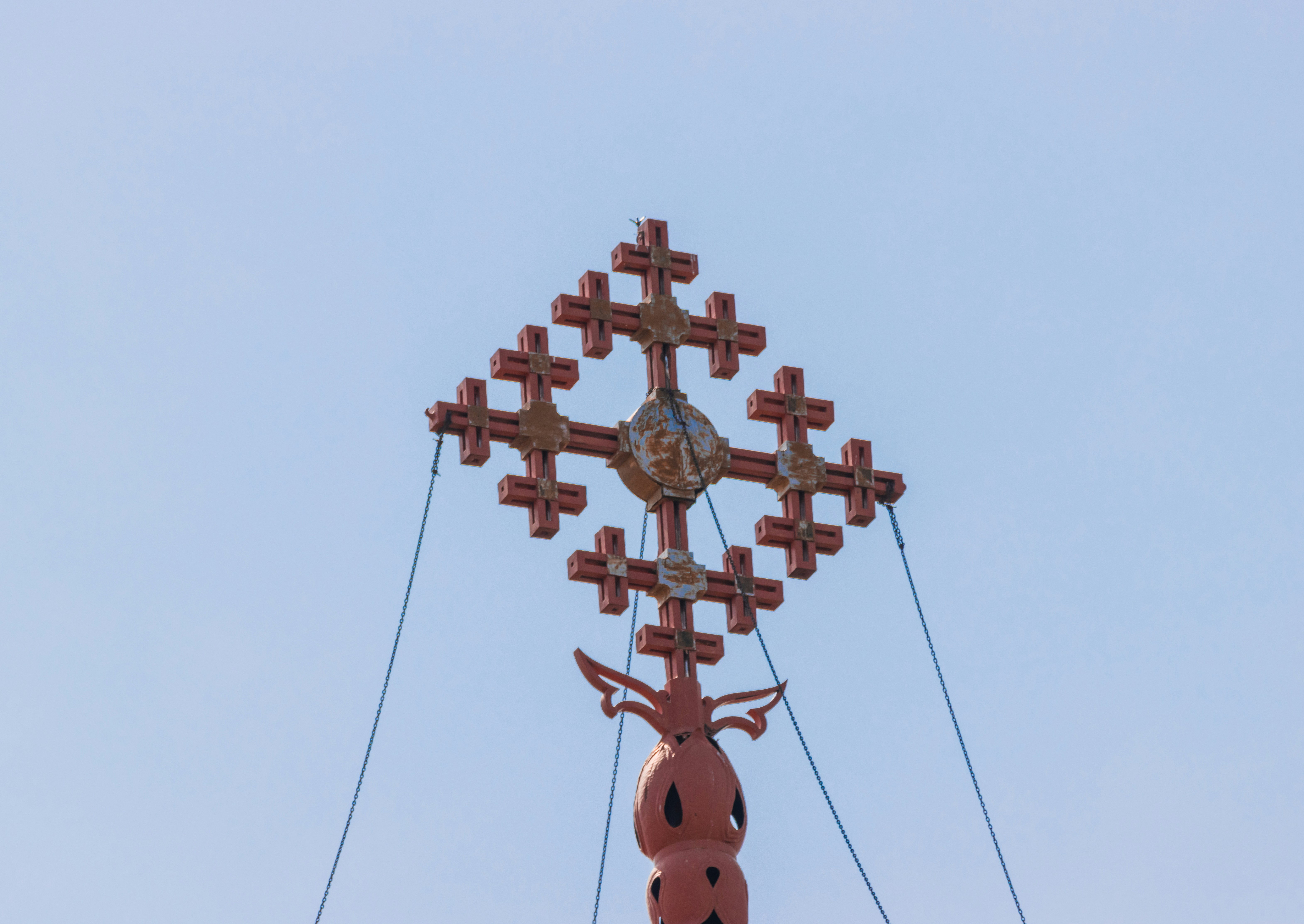 a red cross on top of a building