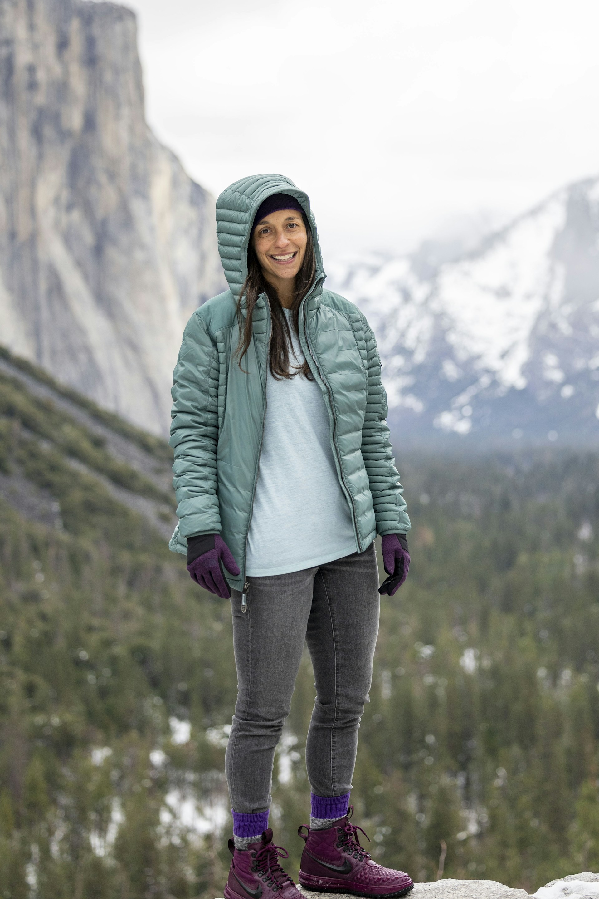 person wearing grey knit sweater