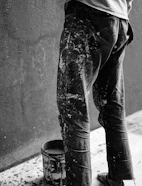 a black and white photo of a person on a skateboard