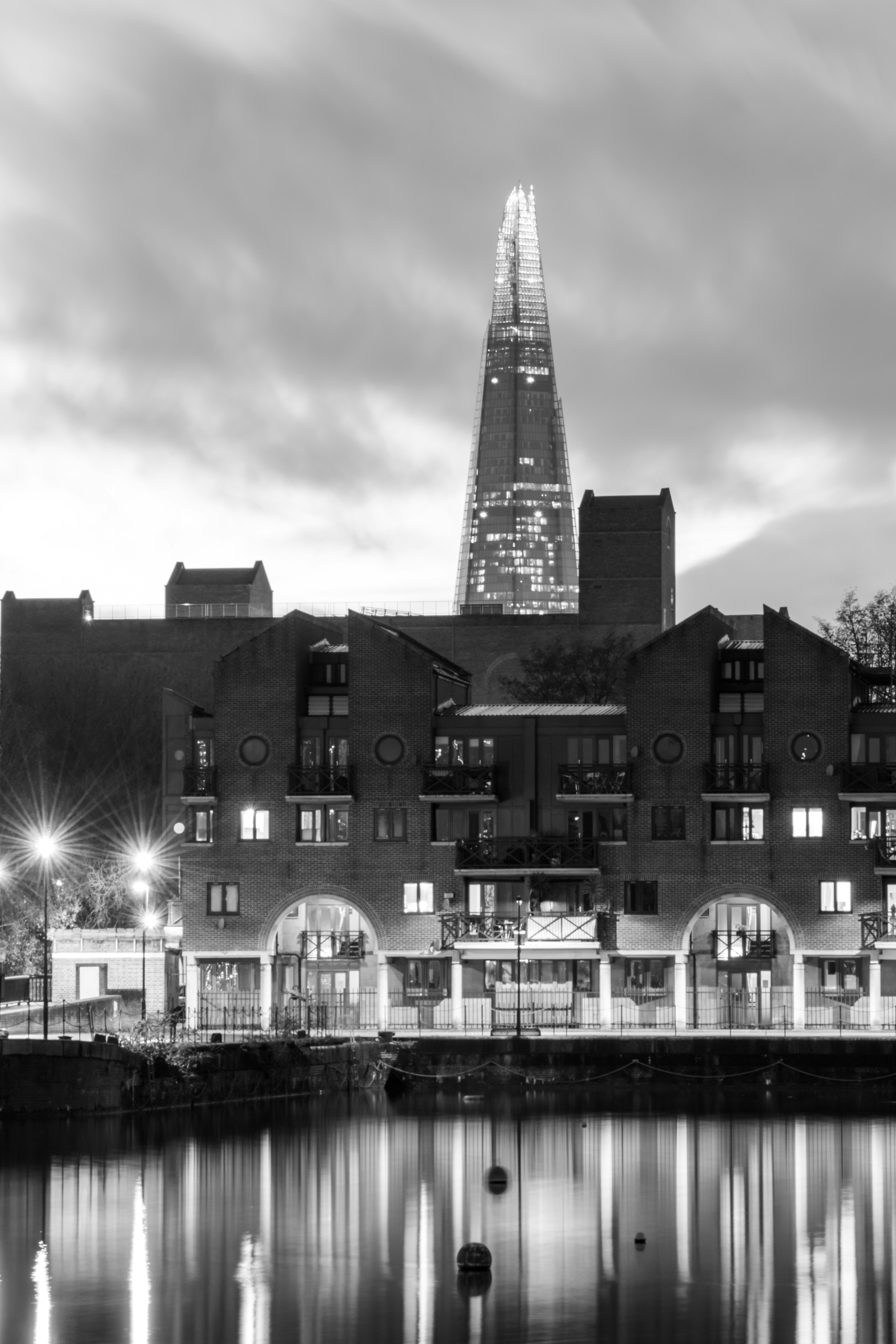 a black and white photo of a large building